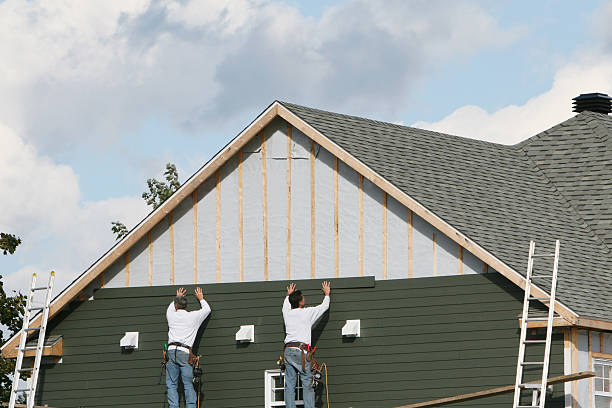 Professional Emergency Siding Repair technician working in Decatur, IL